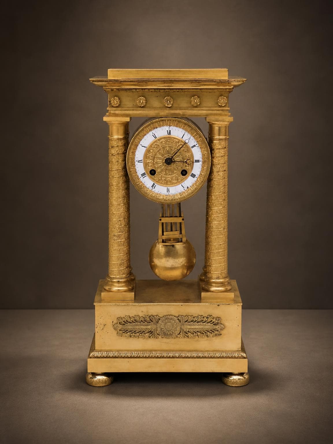 Four-column gilt bronze portico clock, Empire Restauration 1810